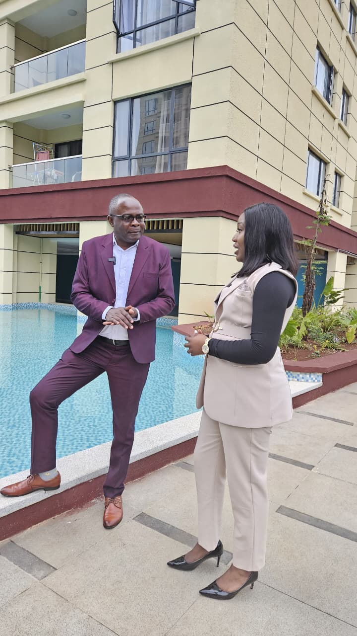 Brenda Kiogora touring a residential development